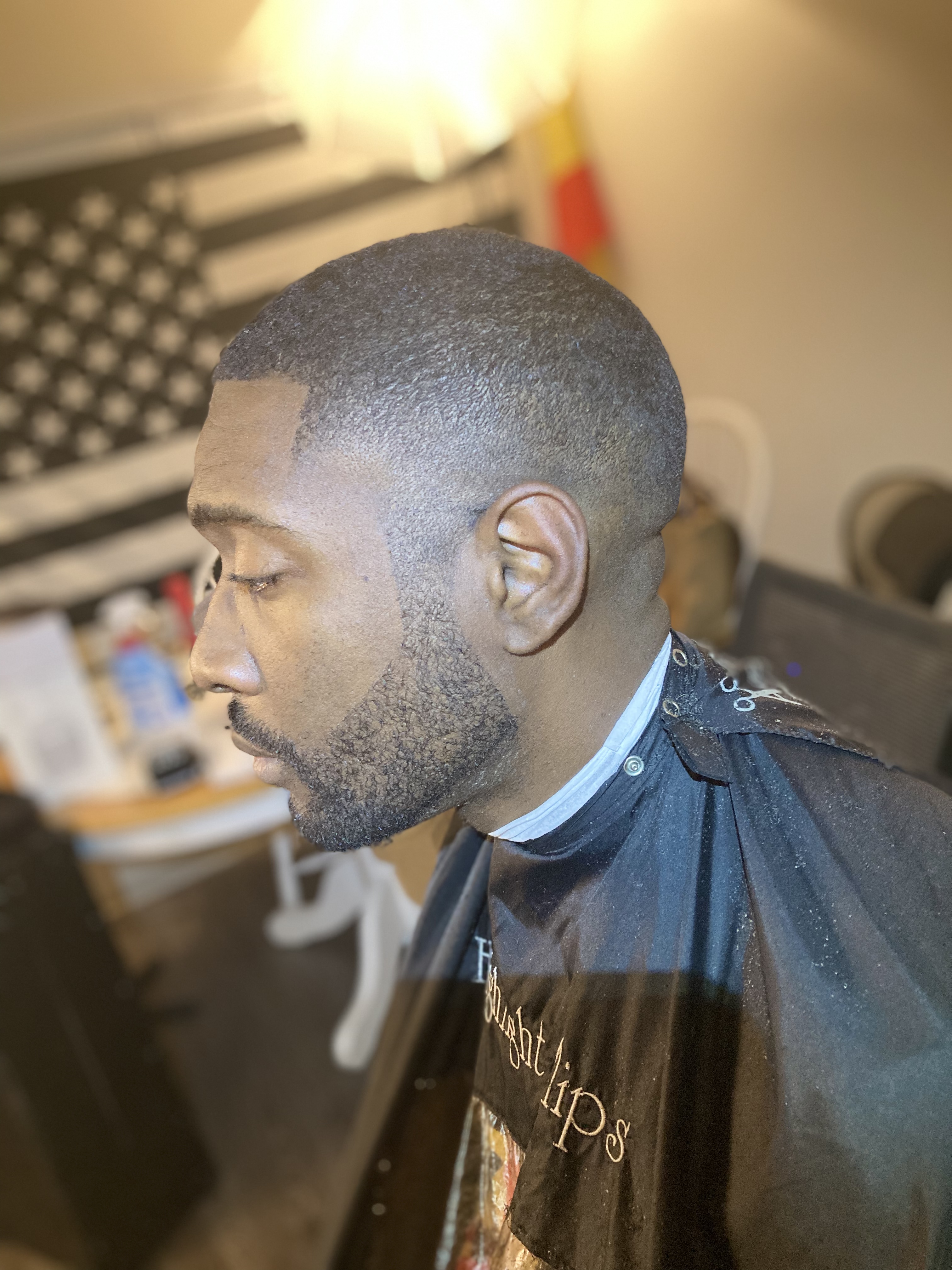 Clean fade with lined-up beard